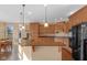 Gourmet kitchen with a granite-topped island and stainless appliances, perfect for entertaining at 9877 Wading Crane Ave, Fishers, IN 46055