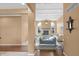 Bright living room featuring a fireplace, arched windows, and a decorative ceiling at 9877 Wading Crane Ave, Fishers, IN 46055