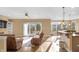 Open living area featuring hardwood floors, lots of natural light, and comfortable furniture at 9877 Wading Crane Ave, Fishers, IN 46055