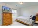 This bedroom has neutral carpet, is freshly painted and has a large window at 102 E Thompson St, Lebanon, IN 46052