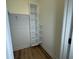 Walk-in closet with custom shelving for optimal storage and organization at 1026 St Peter St, Indianapolis, IN 46203