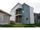 Modern two-story home with a unique facade and inviting double-decker balcony at 1026 St Peter St, Indianapolis, IN 46203