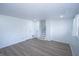Spacious finished basement with neutral tones, new floors, and a staircase leading to the upper level at 10321 Starview Dr, Indianapolis, IN 46229