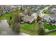 Charming home featuring a well-maintained lawn, private deck, and tranquil pond access at 10407 Stillwell Ct, Avon, IN 46123