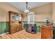 A dining area with a display cabinet and ample lighting at 10407 Stillwell Ct, Avon, IN 46123