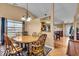 Inviting dining room featuring a wooden table, chairs, and a decorative 'Gathering' wall accent at 10407 Stillwell Ct, Avon, IN 46123