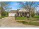 Charming one-story home with a two-car garage and well-maintained lawn at 10407 Stillwell Ct, Avon, IN 46123