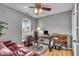 Functional home office space with a desk, rolling chair, and natural light from the window at 10407 Stillwell Ct, Avon, IN 46123