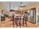 Bright kitchen featuring a center island, stainless appliances, and a view to the Gathering room at 10407 Stillwell Ct, Avon, IN 46123