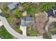 Stunning aerial view of home with a well-maintained lawn, mature trees, and a spacious driveway in a desirable neighborhood at 108 Wesley Cir, Noblesville, IN 46062