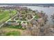 Beautiful aerial view of lakeside homes, a golf course, and neighborhood landscape at 108 Wesley Cir, Noblesville, IN 46062