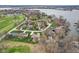 Beautiful aerial view of lakeside homes, a golf course, and neighborhood landscape at 108 Wesley Cir, Noblesville, IN 46062