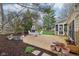 Inviting backyard patio with outdoor fireplace and seating, perfect for entertaining at 108 Wesley Cir, Noblesville, IN 46062
