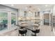 Modern kitchen featuring stainless steel appliances, gray countertops, and island with seating at 108 Wesley Cir, Noblesville, IN 46062