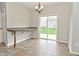 Dining room featuring a door to the outside and a built-in table at 11188 Giddings Pl, Noblesville, IN 46060