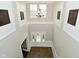 High angle shot of the entry and stairway with high ceiling and chandelier at 11188 Giddings Pl, Noblesville, IN 46060