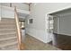 View of the foyer featuring tile floors and stairs to the second story at 11188 Giddings Pl, Noblesville, IN 46060
