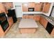 Spacious kitchen with a large island, ample storage, and stainless steel appliances at 11188 Giddings Pl, Noblesville, IN 46060