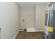 Laundry room with tile flooring and essential hookups, with room for appliances and storage at 11188 Giddings Pl, Noblesville, IN 46060