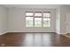 Inviting living room featuring gleaming hardwood floors and lots of natural light at 11188 Giddings Pl, Noblesville, IN 46060