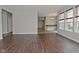 Open-concept living room with hardwood floors connecting to dining area at 11188 Giddings Pl, Noblesville, IN 46060