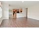 Open-concept living room showcasing a seamless transition to the kitchen at 11188 Giddings Pl, Noblesville, IN 46060