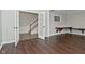 Home office features hardwood floors, built-in desk and view into the entry way at 11188 Giddings Pl, Noblesville, IN 46060