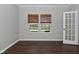 View of the office with hardwood flooring and two windows at 11188 Giddings Pl, Noblesville, IN 46060