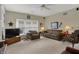 Living room with a sitting area with lots of windows providing ample natural light at 11247 Reflection Point Dr, Fishers, IN 46037
