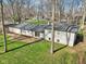 Beautiful home showcasing the backyard with a paved patio at 11921 Westwood Dr, Carmel, IN 46033