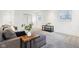Cozy basement living area with comfortable sectional, coffee table and modern shelving at 11921 Westwood Dr, Carmel, IN 46033