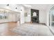 Bright and airy living room with modern fireplace and skylight at 11921 Westwood Dr, Carmel, IN 46033