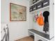Organized mudroom area with built-in bench, storage, and stylish decor at 11921 Westwood Dr, Carmel, IN 46033