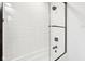 Modern shower features white tile surround, black fixtures, and glass door at 11921 Westwood Dr, Carmel, IN 46033