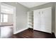 Cozy room featuring hardwood floors and a built-in white cabinet, perfect for storage or display at 1337 Linden St, Indianapolis, IN 46203