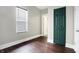 This bedroom provides hardwood floors, closet, and a window offering natural light, crafting a comfortable space at 1337 Linden St, Indianapolis, IN 46203