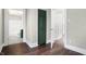 The hallway features hardwood floors, connecting to a bathroom and closet for easy accessibility at 1337 Linden St, Indianapolis, IN 46203