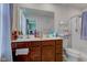 Bathroom features a double vanity, ample storage, and a tiled shower at 13872 N Mardenis W Dr, Camby, IN 46113