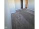 Bedroom features plush carpeting, neutral walls, and an open closet, offering a relaxing ambiance at 13872 N Mardenis W Dr, Camby, IN 46113