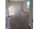Bright bedroom featuring neutral walls, plush carpet, and a sunlit window offering natural light at 13872 N Mardenis W Dr, Camby, IN 46113