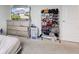 Cozy bedroom with dresser, flat screen TV, and shoe rack at 13872 N Mardenis W Dr, Camby, IN 46113