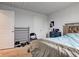 Bedroom featuring a light blue bedspread, with a chair and dresser at 13872 N Mardenis W Dr, Camby, IN 46113