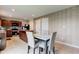 Well-appointed kitchen with dark wood cabinets, stainless steel appliances, and a functional center island at 13872 N Mardenis W Dr, Camby, IN 46113