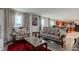 Elegant living room with luxurious furnishings, large windows, and neutral decor at 13872 N Mardenis W Dr, Camby, IN 46113