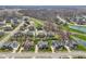 Aerial view of a residential neighborhood with tree-lined streets at 14747 Harvest Glen S Blvd, Fishers, IN 46037