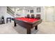 Finished basement featuring a pool table, comfortable seating, and decorative wall art at 14747 Harvest Glen S Blvd, Fishers, IN 46037