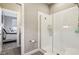 Modern bathroom featuring a tiled shower with glass door and neutral wall paint color at 14747 Harvest Glen S Blvd, Fishers, IN 46037