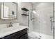 Modern bathroom featuring a sleek vanity and tiled walk-in shower at 14747 Harvest Glen S Blvd, Fishers, IN 46037