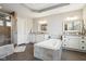 Relaxing bathroom features a large tub, walk in shower, double sinks and neutral paint at 14747 Harvest Glen S Blvd, Fishers, IN 46037