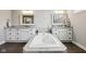 This bathroom has a large tub, double sinks and neutral paint at 14747 Harvest Glen S Blvd, Fishers, IN 46037